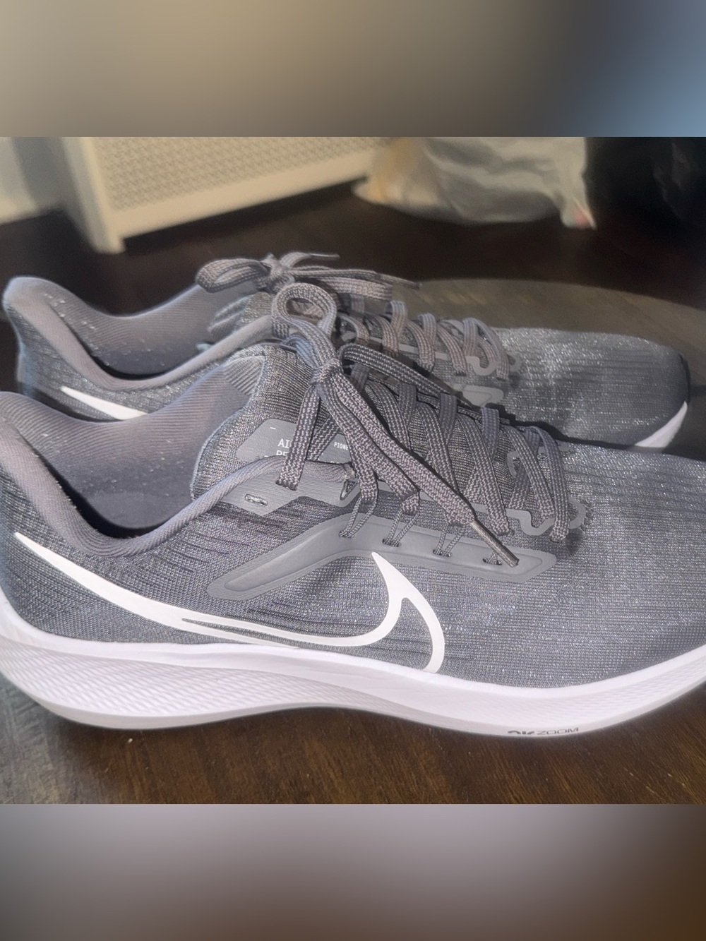 Nike Men’s Gray Athletic Running Shoes with White Swoosh
